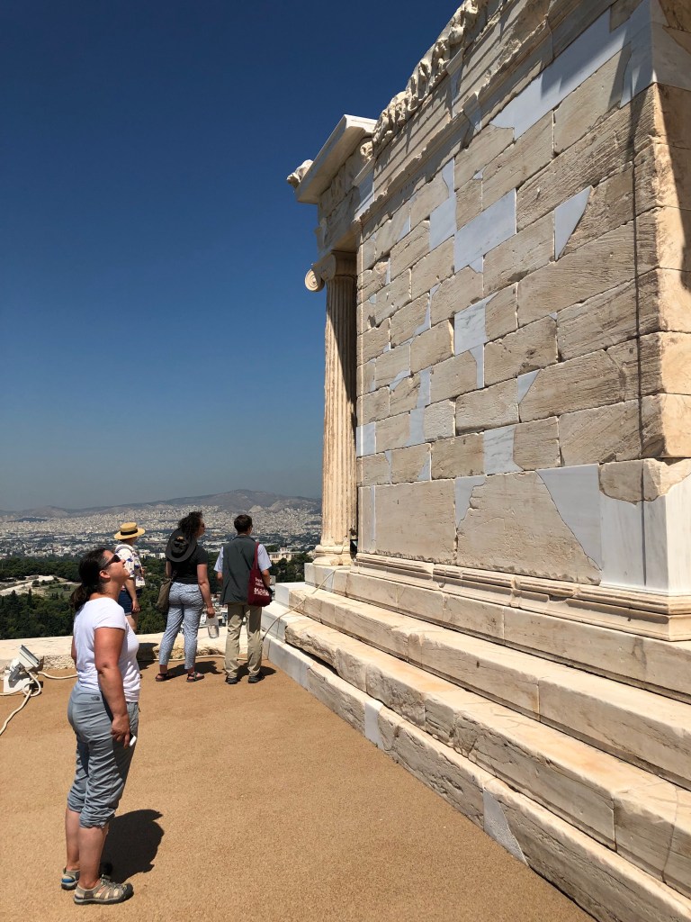 Rebecca Futo Kennedy at the temple of Athena Nike on the Acropolis