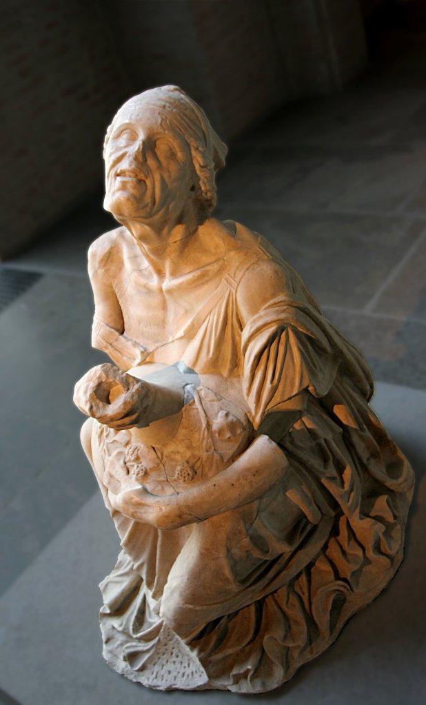 Old Drunken Woman: This old woman cradles a large wine jar in her lap as she sits happily drunk on a rock. The fine quality of her garments and jewelry and of the sculpture itself suggests that she is not poor and downtrodden. She may have been a wealthy participant in a festival of Dionysos who commissioned this sculpture as an offering to the god of wine. Statue, Glyptothek, Munich, Roman copy of a Greek original of the 3rd century B.C.