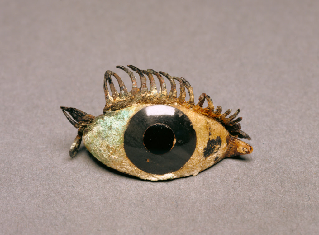 Eye from a Bronze Statue, 5th - 2nd century B.C., Marble, obsidian, glass, and copper; 2.1 × 4.9 cm (13/16 × 1 15/16 in.), 84.AI.625. The J. Paul Getty Museum, Villa Collection, Malibu, California