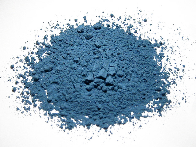 close-up of a ground, blue pigment which looks like a powder.