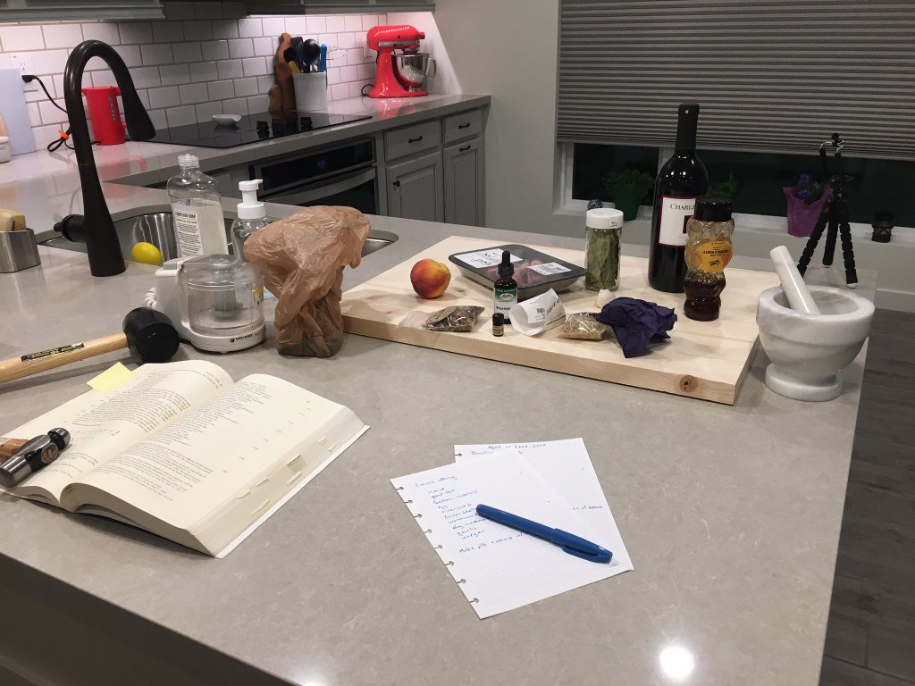 A collection of objects on a table used in the making of incense. This image was taken in a modern laboratory.