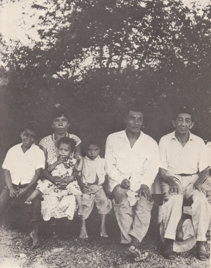 Helena Valero, who was kidnapped as a girl by Indigenous Amazonians, sits for a photo with her father, husband, and three children after she left the jungle.