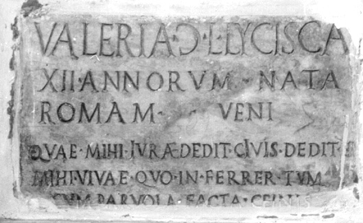 Black and white image of a Latin inscription.
