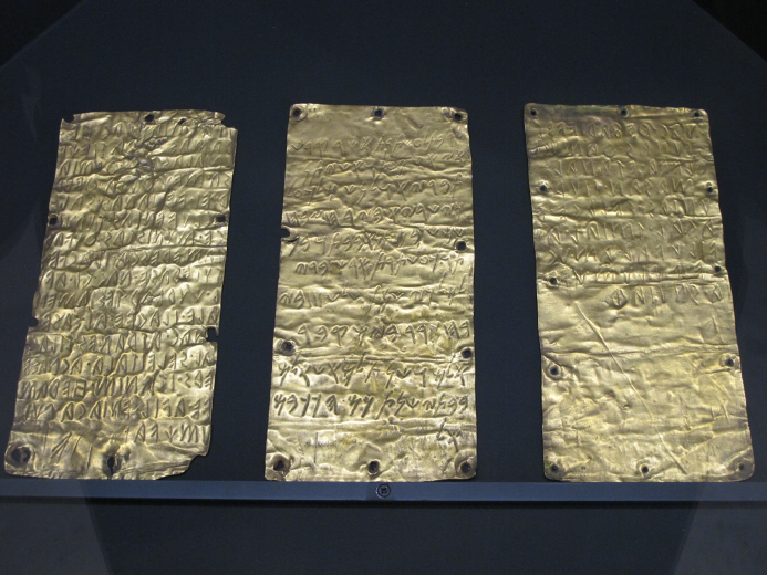 Three gold tablets with both Phoenician and Etruscan texts on them.