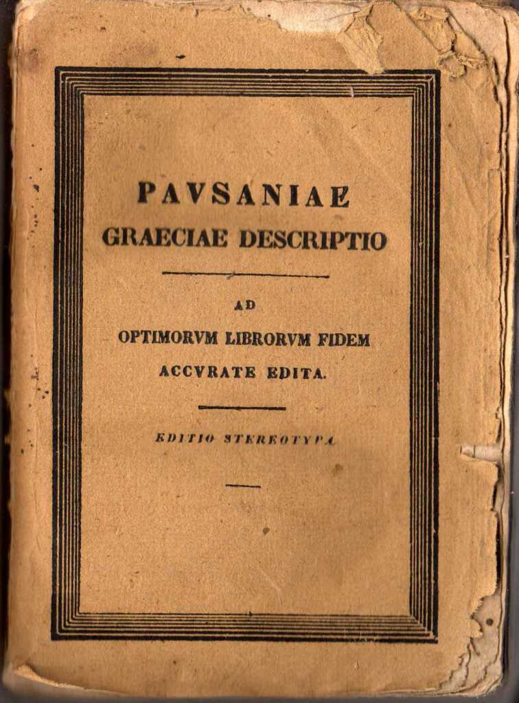 The inside cover page of an 1829 edition of Pausanias - the pages are very yellowed and broken around the edges. The letters say: "PAVSANIAE GRAEVIAE DESCRIPTIO, AD OPTIMORVM LIIBRORVM FIDEM ACCVRATE EDITA, EDITIO STERKOTYRA"