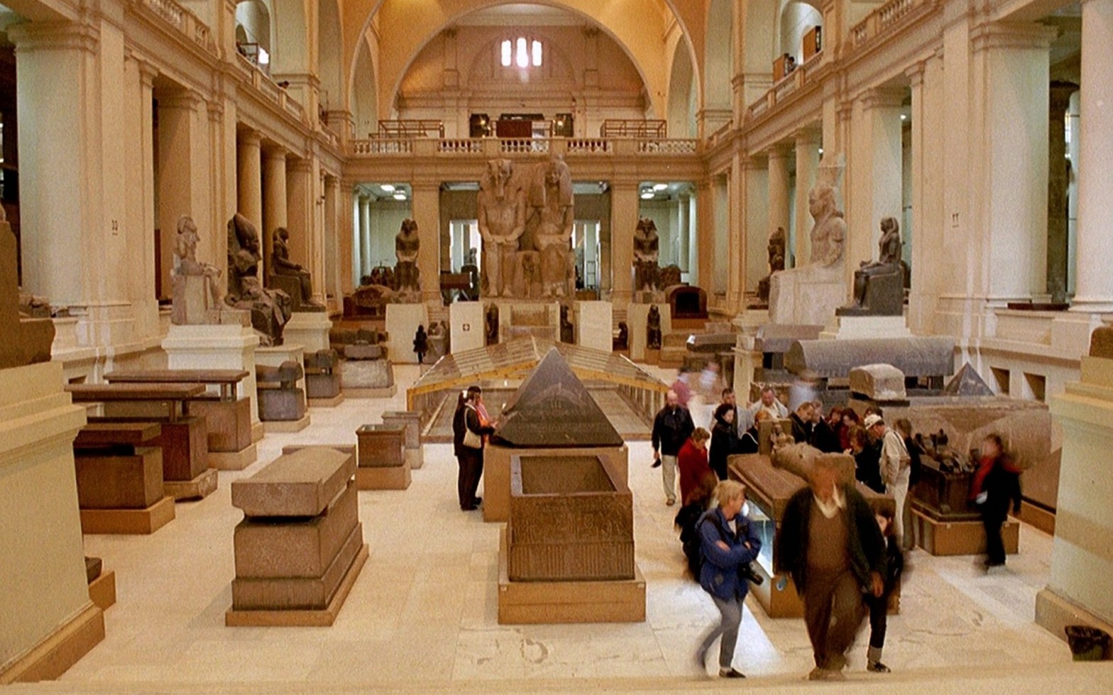 View of a museum gallery filled with coffins