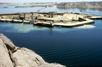 Partially flooded Isis Temple with the retaining walls visible during the transfer of the temple to another island.
