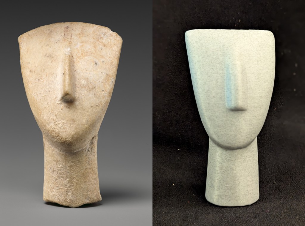 On the left side of the screen is a marble cycladic head, while the right side of the screen bears a 3D replica of the same head. Both are white with a large protruding nose. 